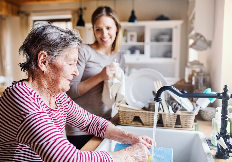 an-elderly-grandmother-with-an-adult-PBUVX6R